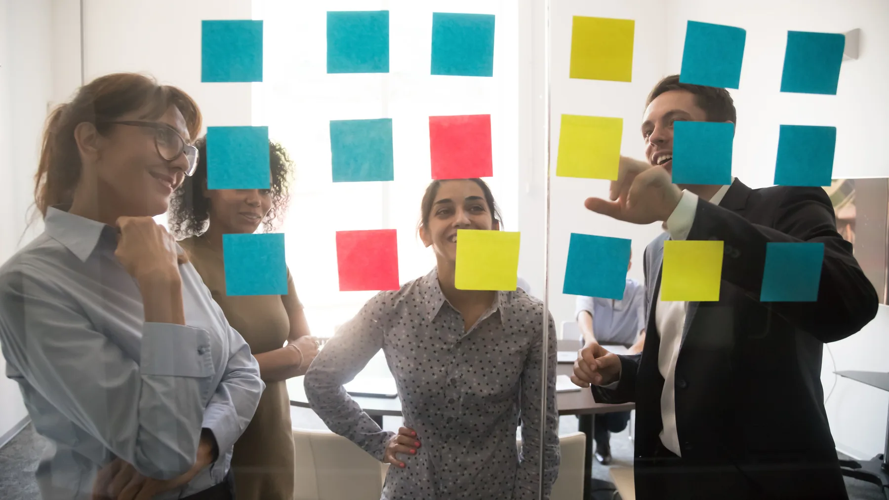 Course development team organizing a visual project timeline